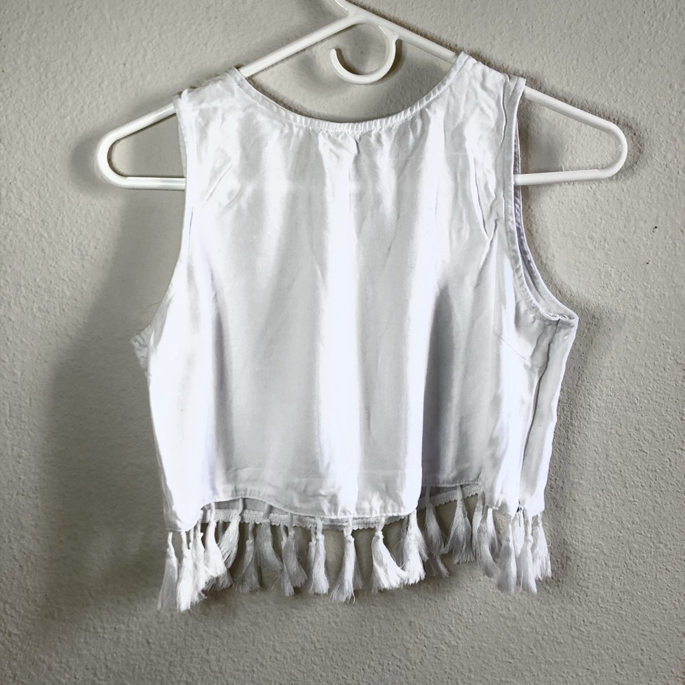 white cropped tank with tassels